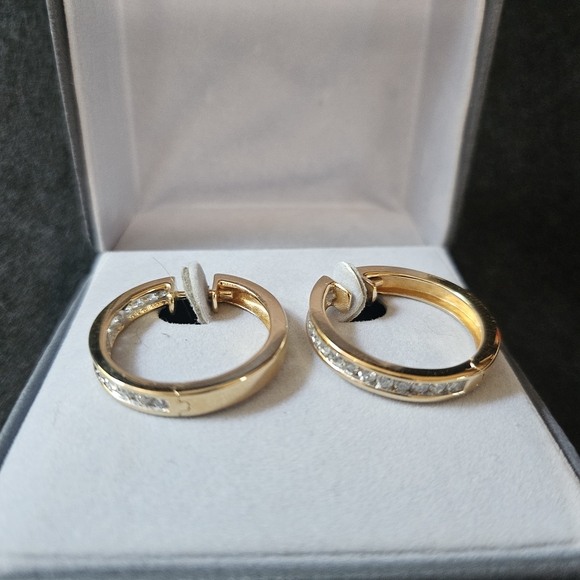 Gold Dangle Earrings with Intricate Design